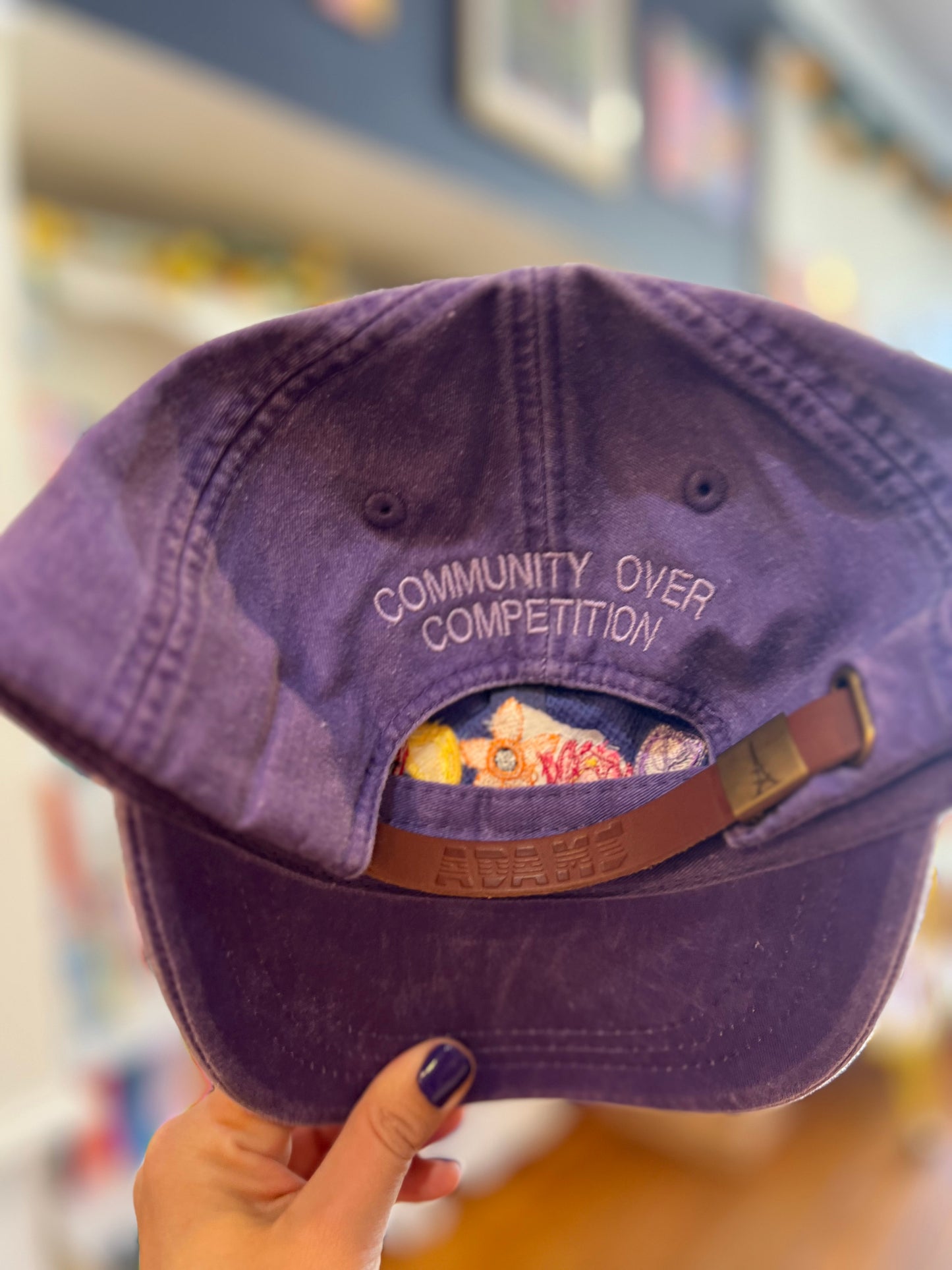 Community Over Competition Baseball Hat