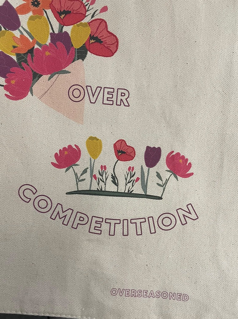 Community Over Competition Tote Bag
