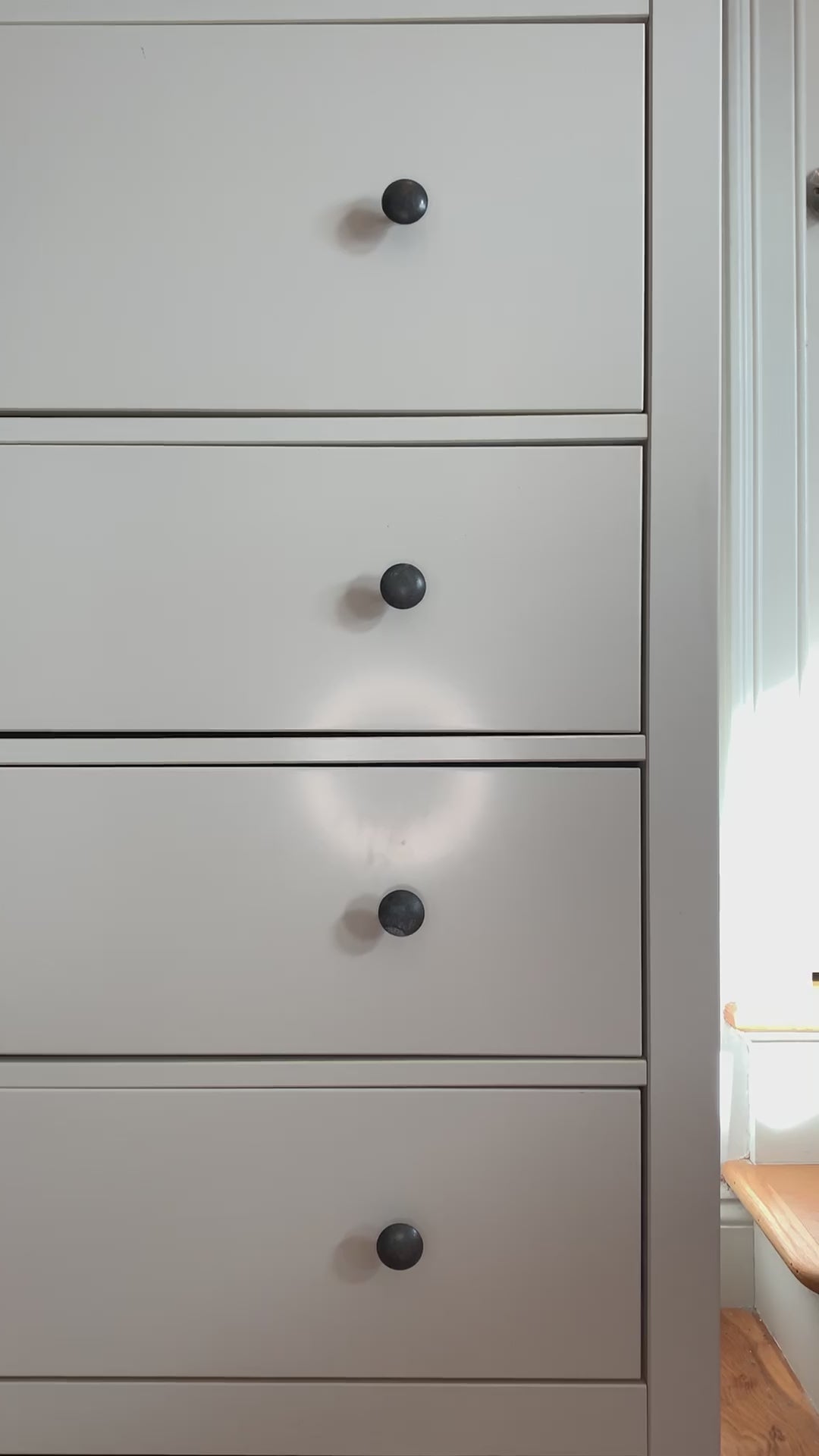 A purple youth tee that reads "Flour Child" hangs on a hanger