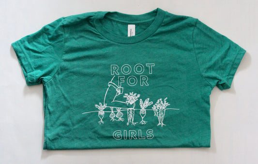 A kelly green toddler tee reads "Root for Girls" in white block letters with a garden illustration