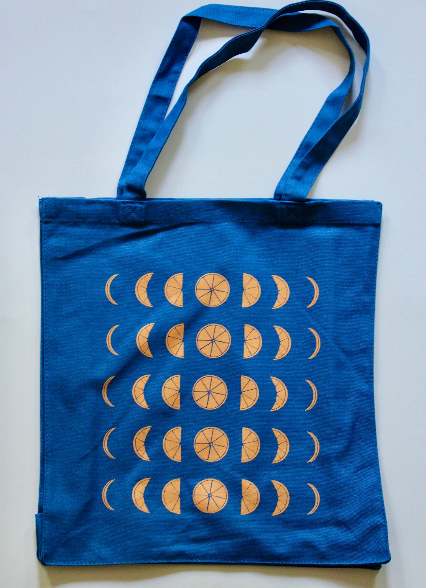 Tangerine Moon Phases Tote Bag