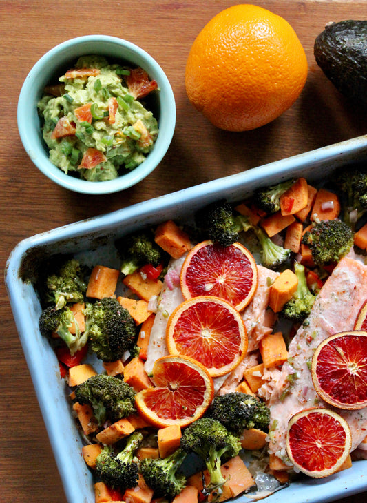 BLOOD ORANGE SALMON WITH FRESNO CHILI ROASTED VEGGIES, AND CITRUS GUACAMOLE