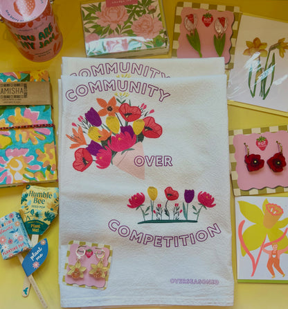 Community Over Competition Tea Towel