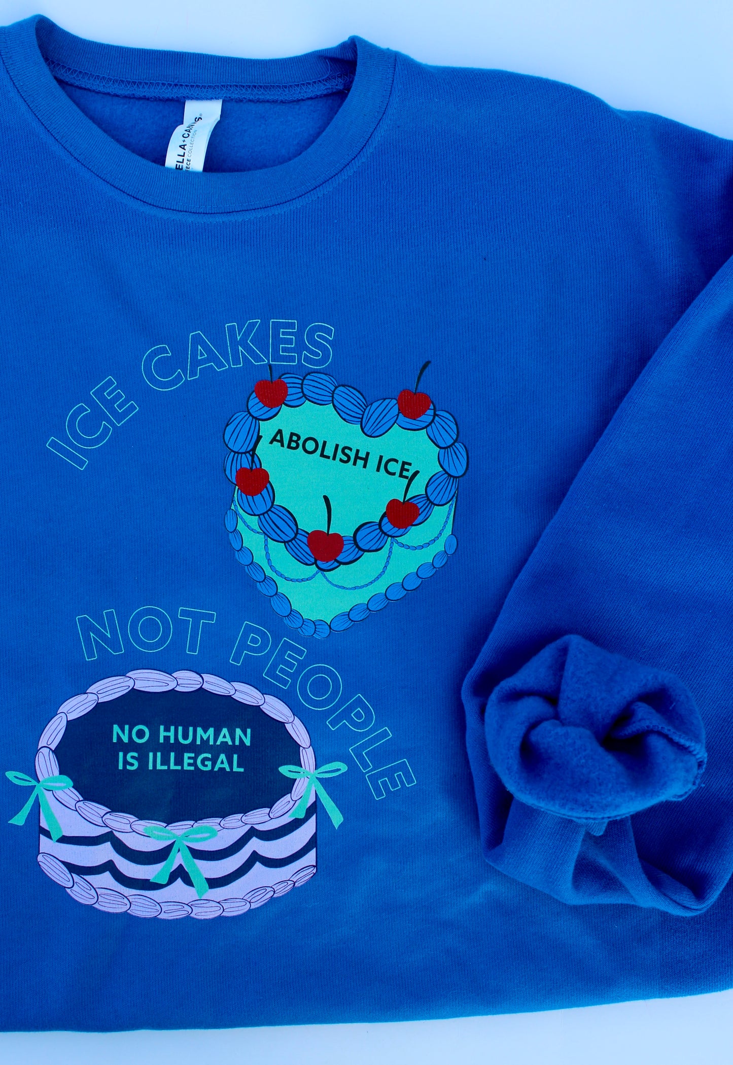Icing Cakes Pro-Immigrant Crewneck Sweatshirt Unisex