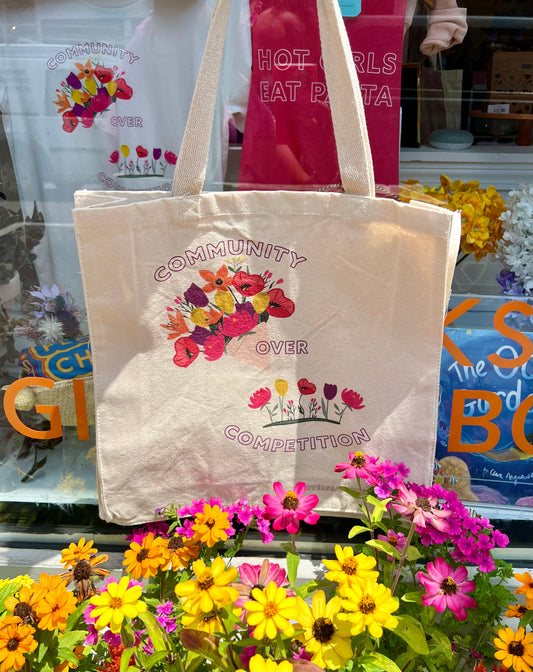 Community Over Competition Tote Bag