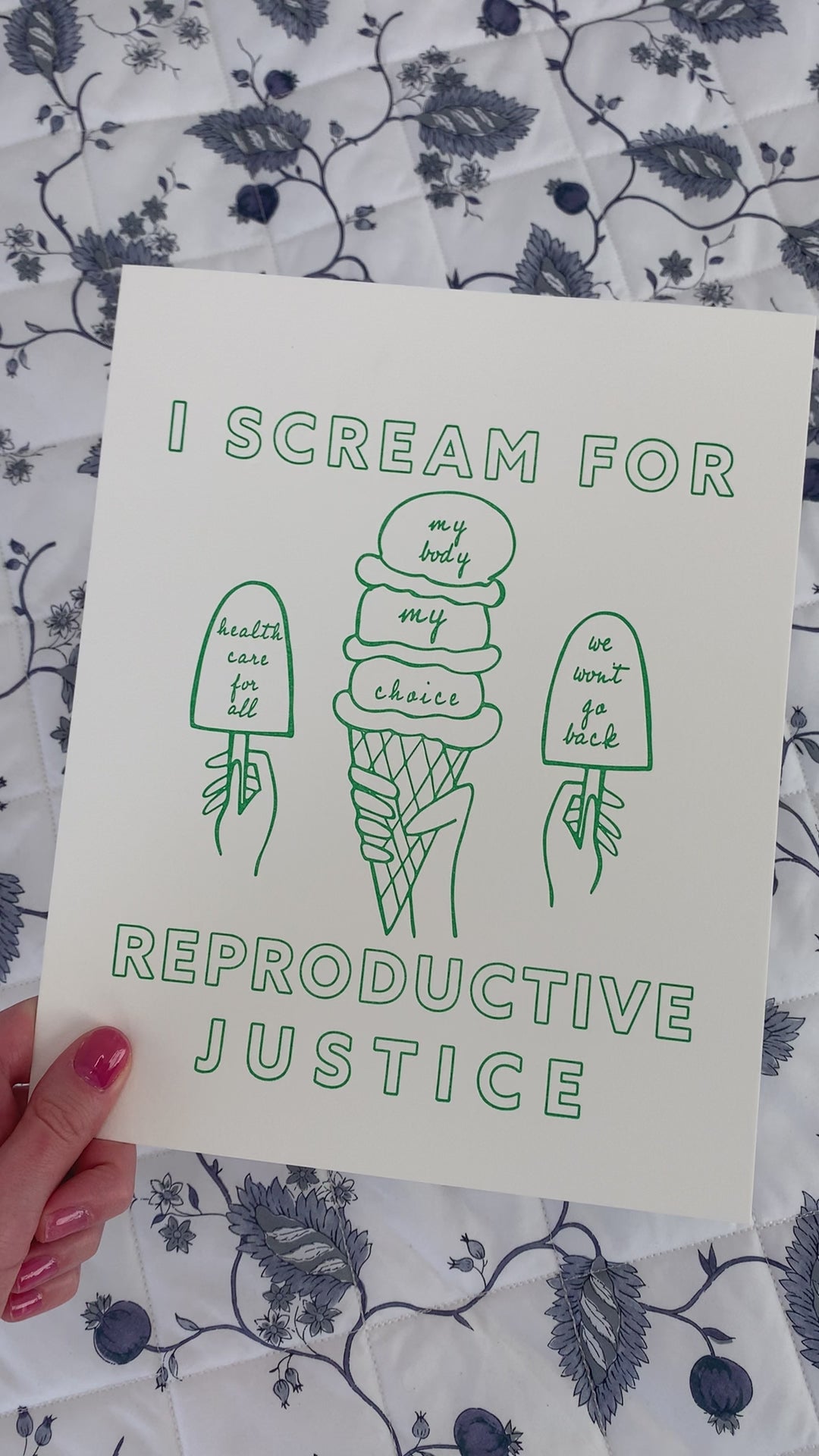 An art print that reads "I Scream for reproductive justice" with ice cream designs in a mint green color