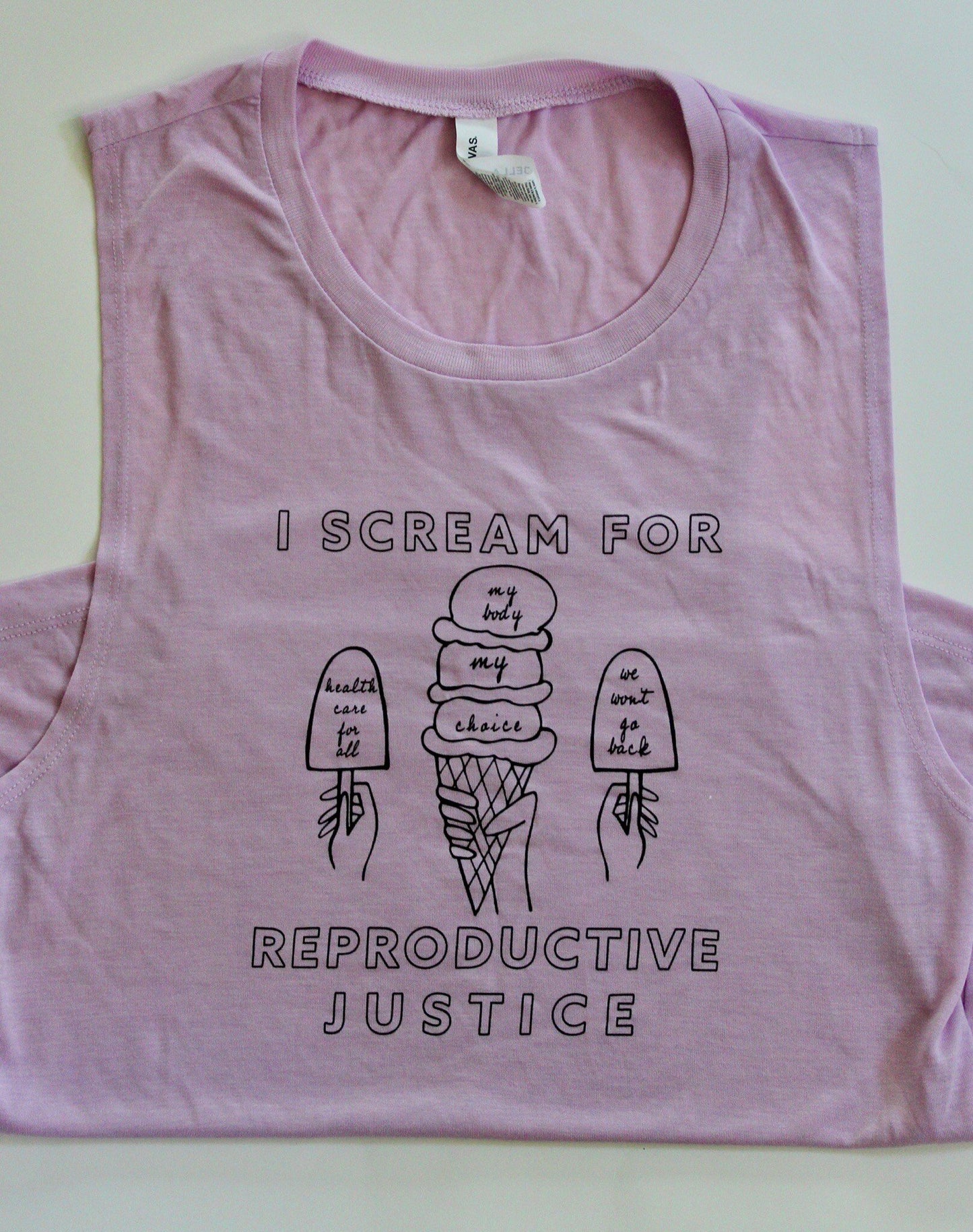 A lilac women's tank with the words I Scream for Reproductive Justice in black block letters with ice cream designs